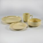 16-piece glossy yellow rimmed stoneware dinner set by Xuye Ceramics