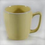 16-piece glossy yellow rimmed stoneware dinner set by Xuye Ceramics