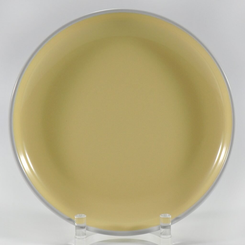 16-piece glossy yellow rimmed stoneware dinner set by Xuye Ceramics