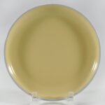 16-piece glossy yellow rimmed stoneware dinner set by Xuye Ceramics