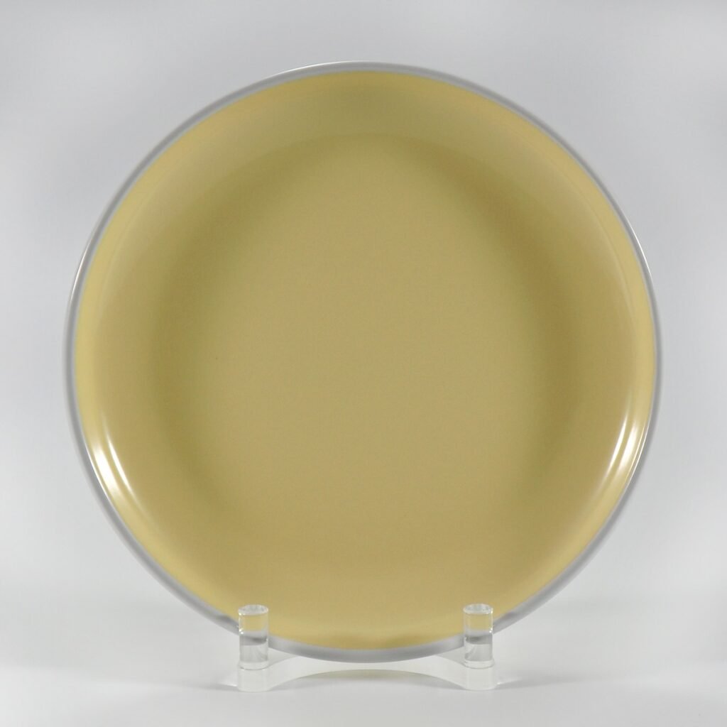 16-piece glossy yellow rimmed stoneware dinner set by Xuye Ceramics