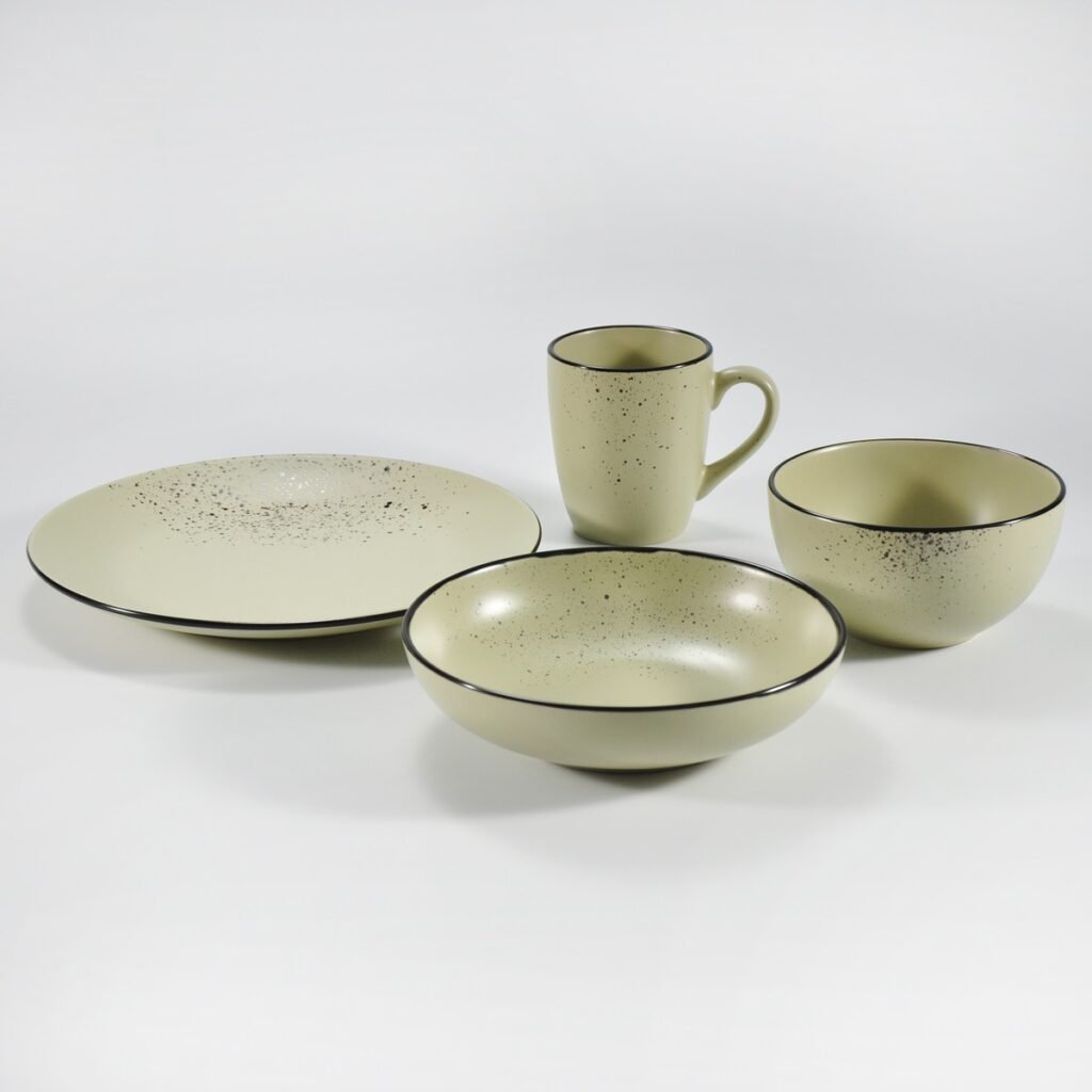 16-piece matte khaki speckled stoneware dinner set by Xuye Ceramics