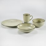 16-piece matte khaki speckled stoneware dinner set by Xuye Ceramics