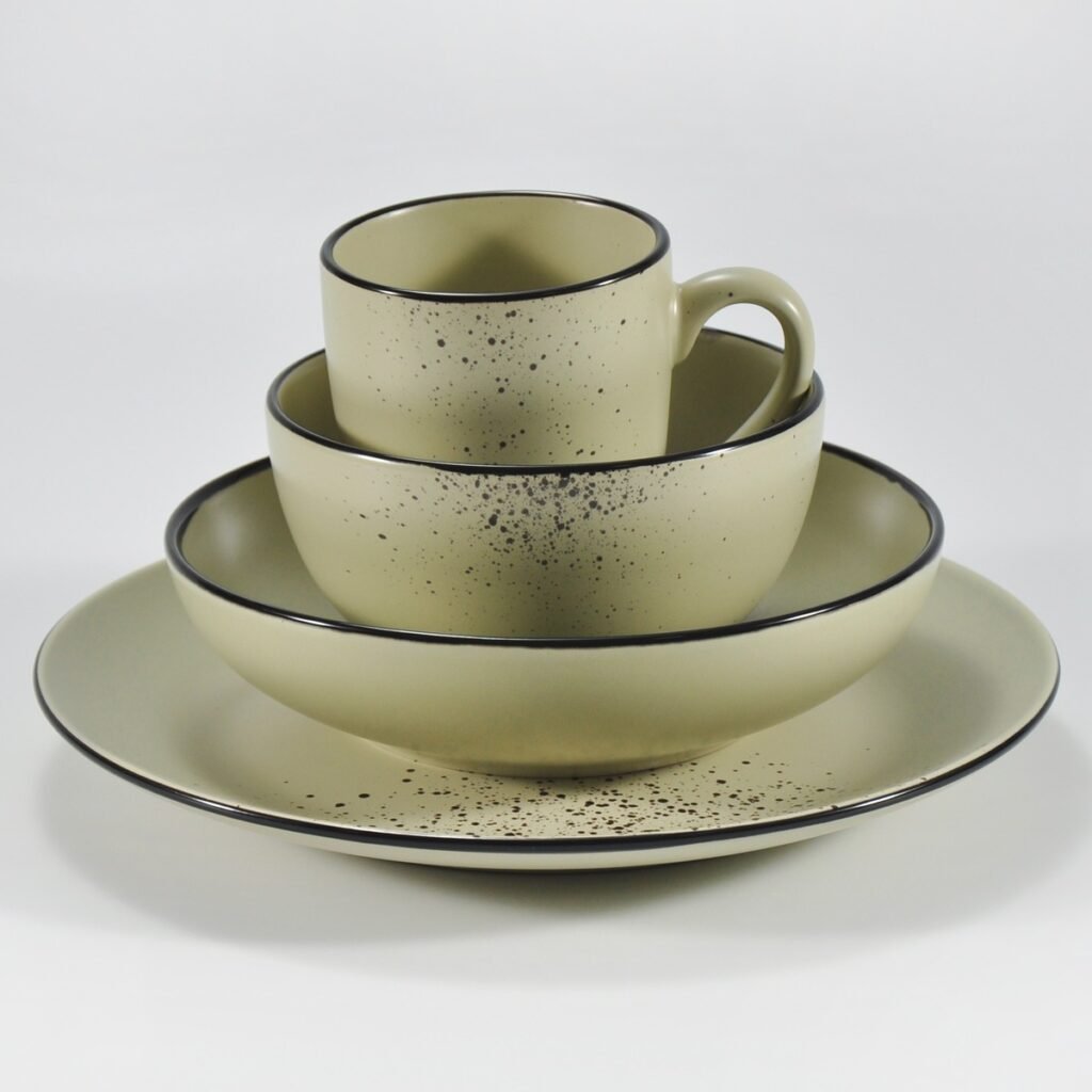 16-piece matte khaki speckled stoneware dinner set by Xuye Ceramics