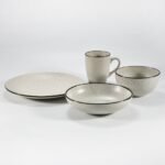 16-piece matte cream speckled stoneware dinner set by Xuye Ceramics