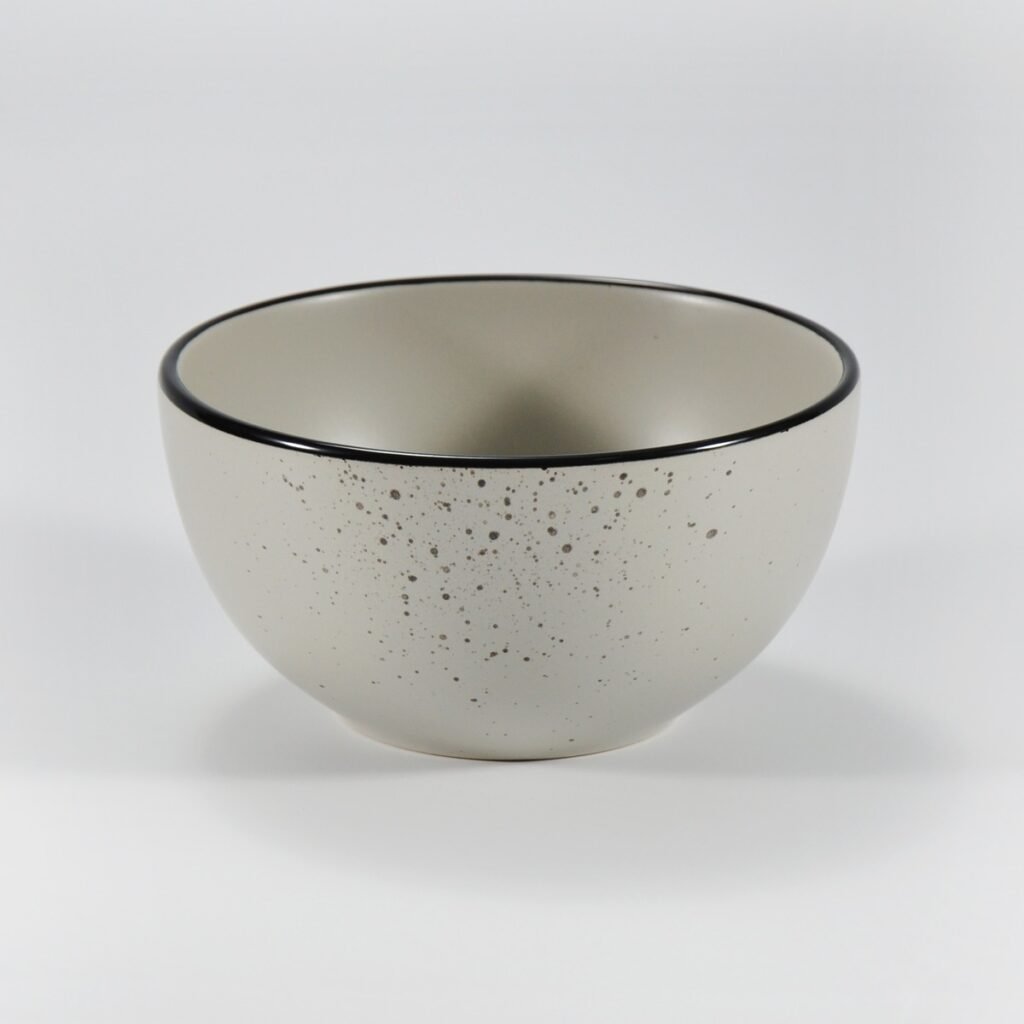 16-piece matte cream speckled stoneware dinner set by Xuye Ceramics