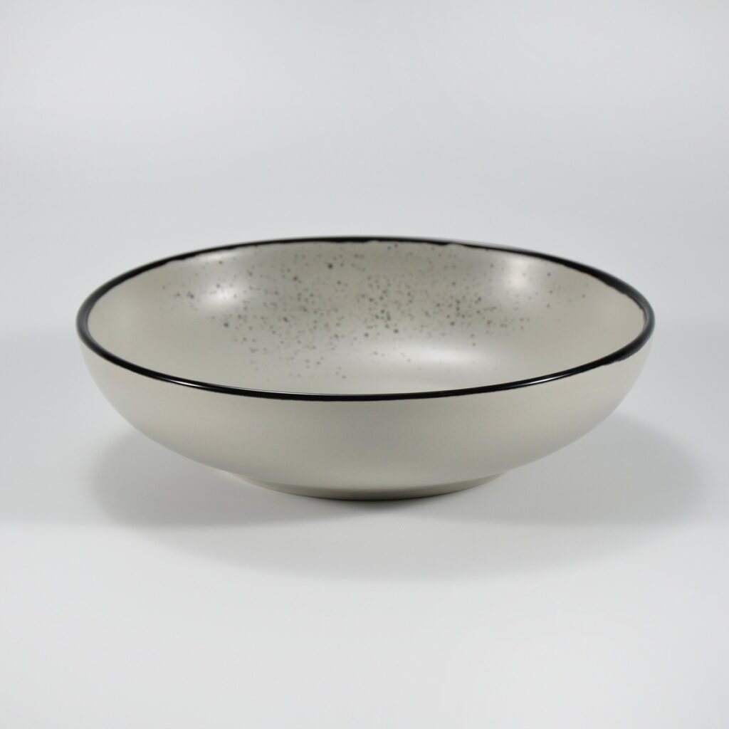 16-piece matte cream speckled stoneware dinner set by Xuye Ceramics