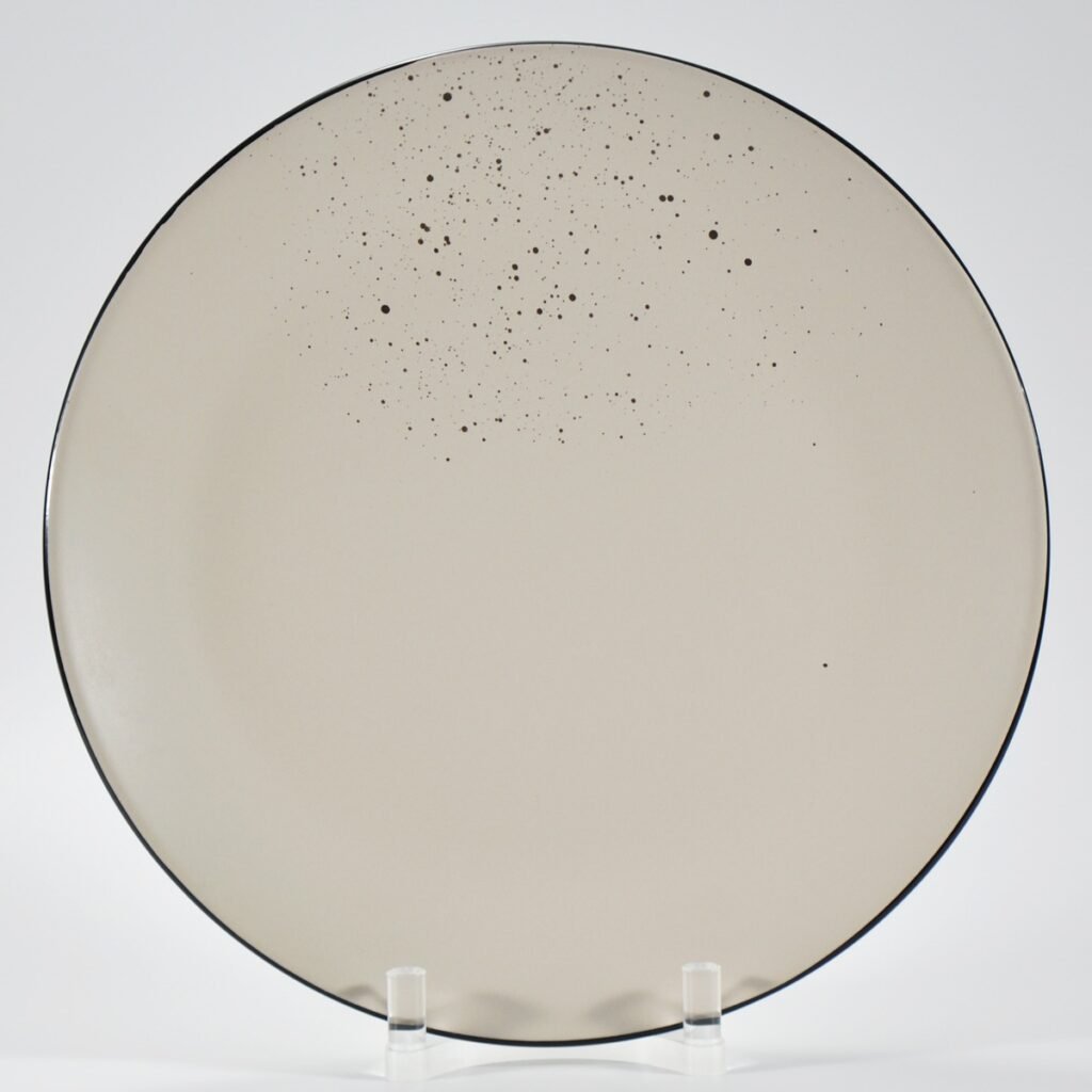 16-piece matte cream speckled stoneware dinner set by Xuye Ceramics