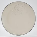 16-piece matte cream speckled stoneware dinner set by Xuye Ceramics