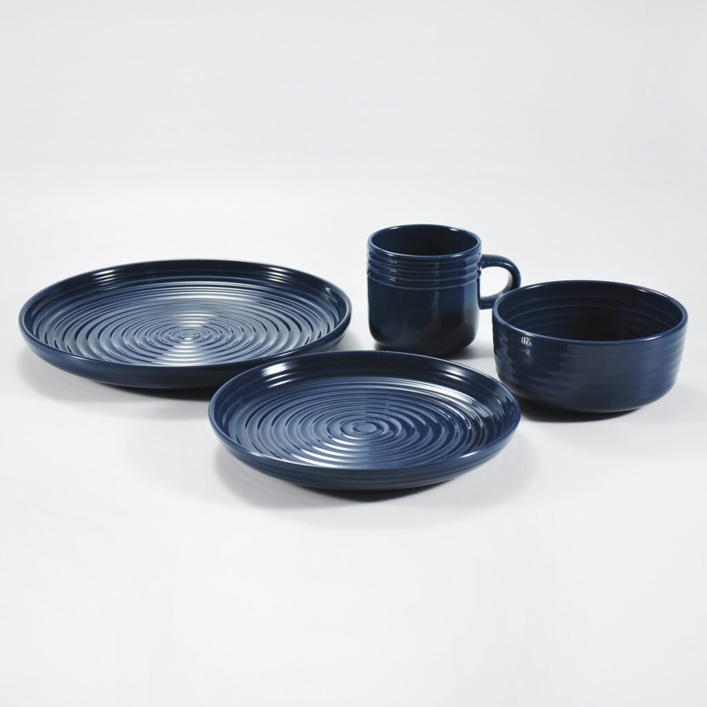 16-piece glossy dark blue embossed stoneware dinner set by Xuye Ceramics