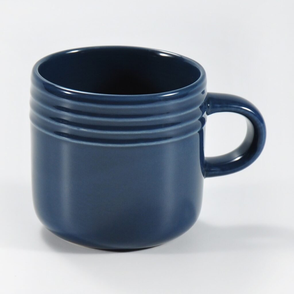 16-piece glossy dark blue embossed stoneware dinner set by Xuye Ceramics