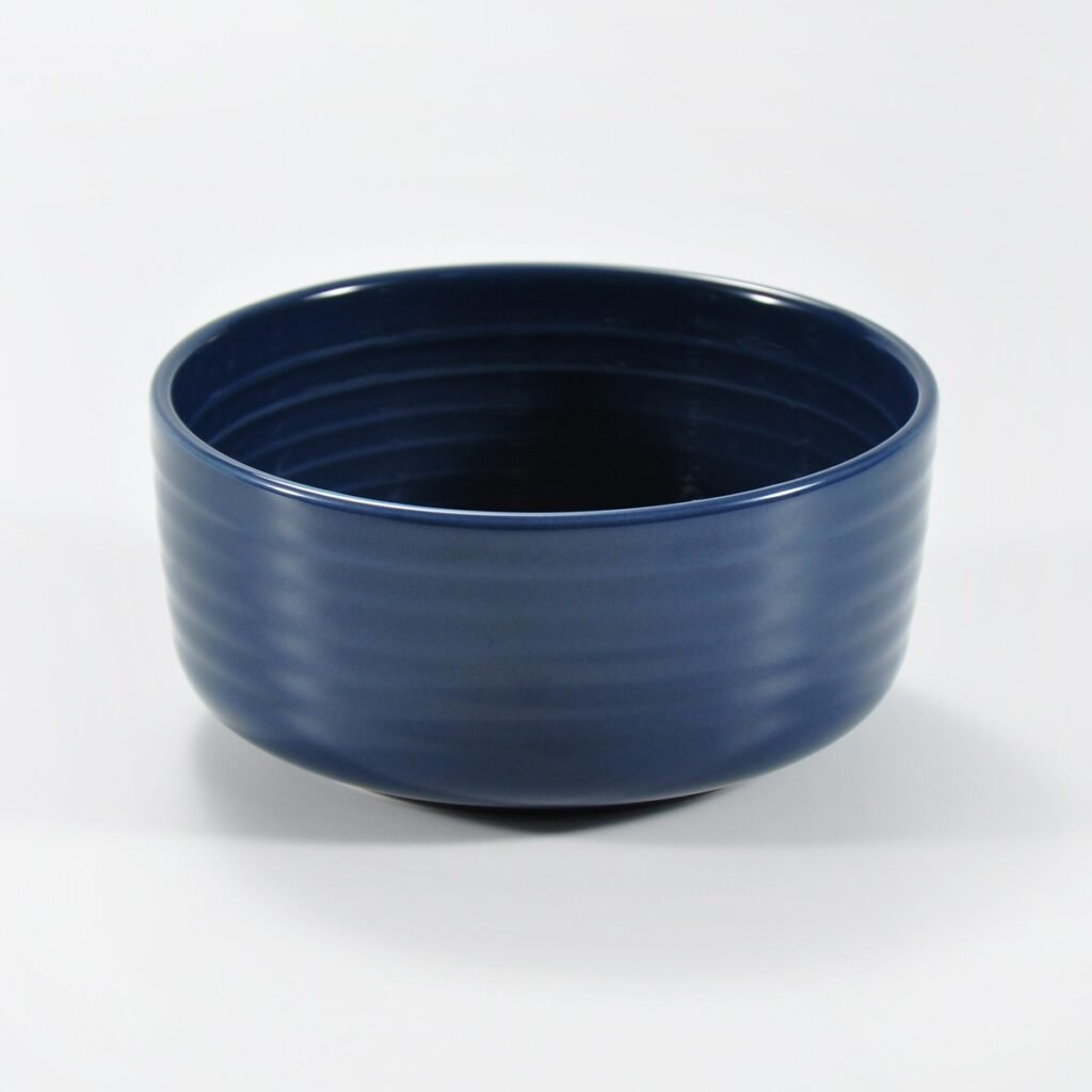 16-piece glossy dark blue embossed stoneware dinner set by Xuye Ceramics