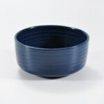 16-piece glossy dark blue embossed stoneware dinner set by Xuye Ceramics