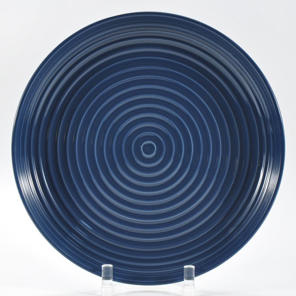 16-piece glossy dark blue embossed stoneware dinner set by Xuye Ceramics