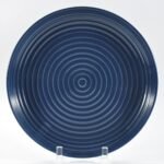 16-piece glossy dark blue embossed stoneware dinner set by Xuye Ceramics