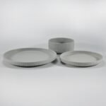 12-piece matte white embossed stoneware dinner set by Xuye Ceramics