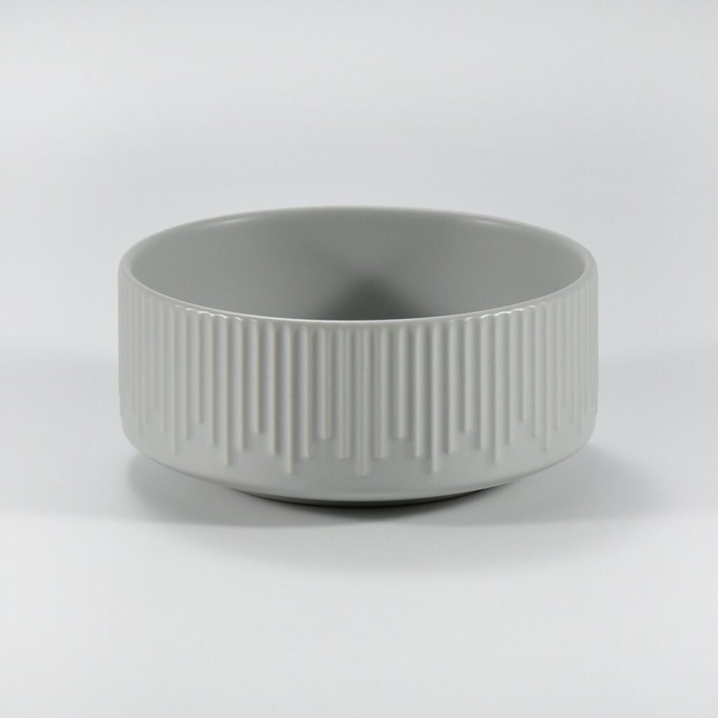 12-piece matte white embossed stoneware dinner set by Xuye Ceramics