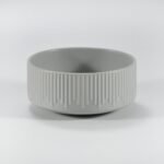 12-piece matte white embossed stoneware dinner set by Xuye Ceramics