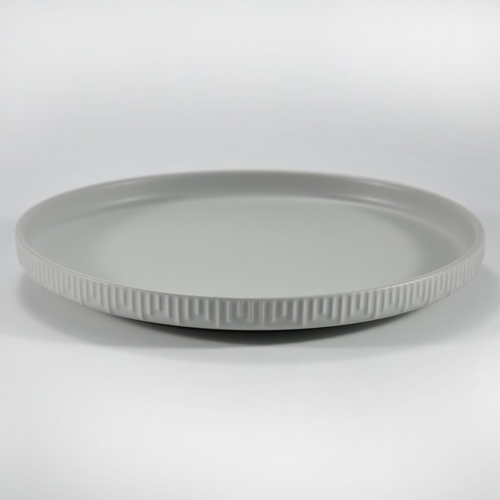12-piece matte white embossed stoneware dinner set by Xuye Ceramics