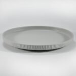 12-piece matte white embossed stoneware dinner set by Xuye Ceramics