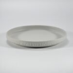 12-piece matte white embossed stoneware dinner set by Xuye Ceramics