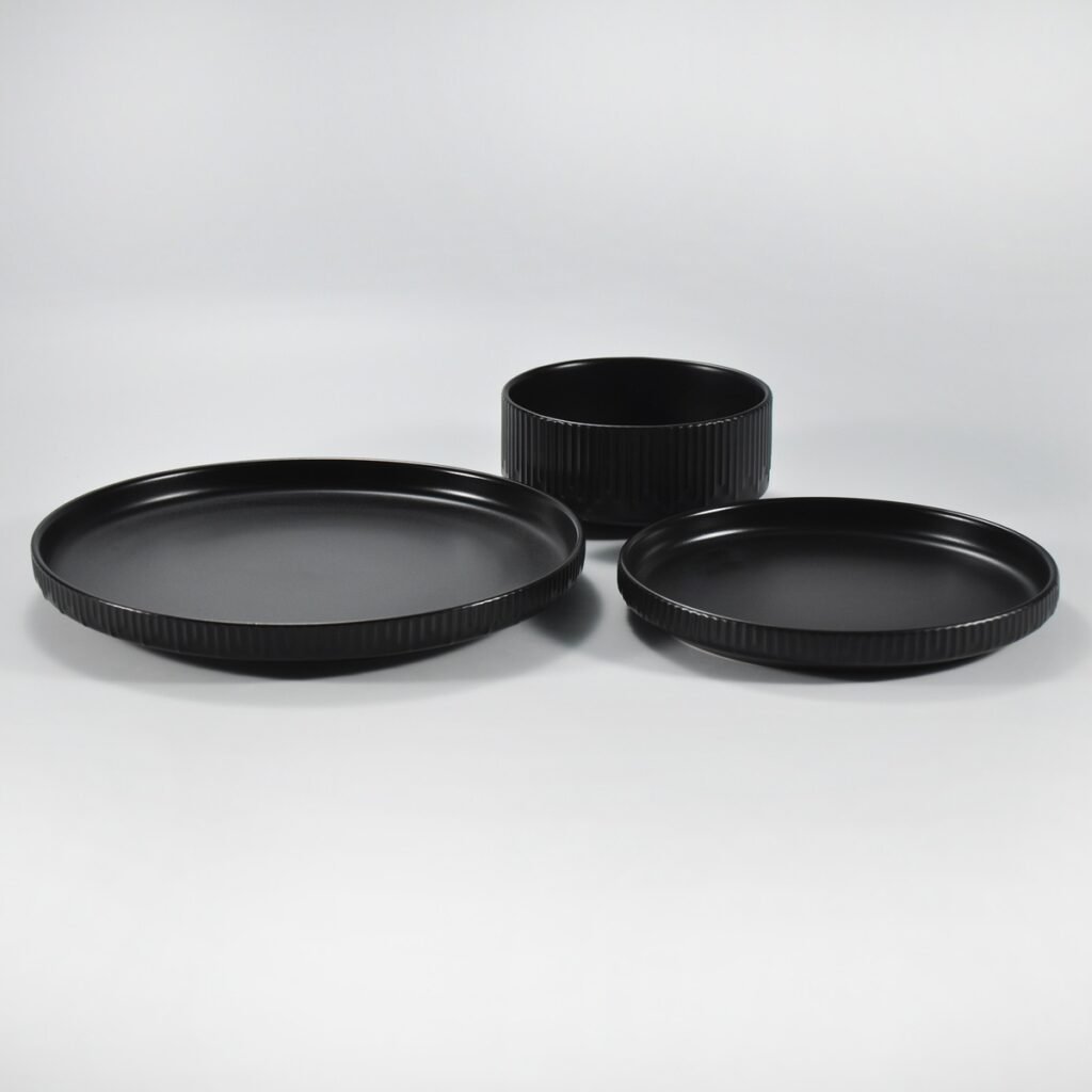 12-piece matte black embossed stoneware dinner set by Xuye Ceramics