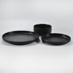 12-piece matte black embossed stoneware dinner set by Xuye Ceramics