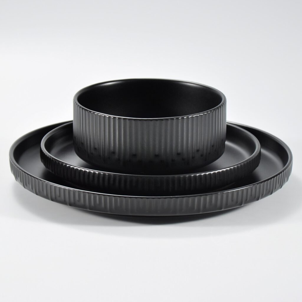 12-piece matte black embossed stoneware dinner set by Xuye Ceramics