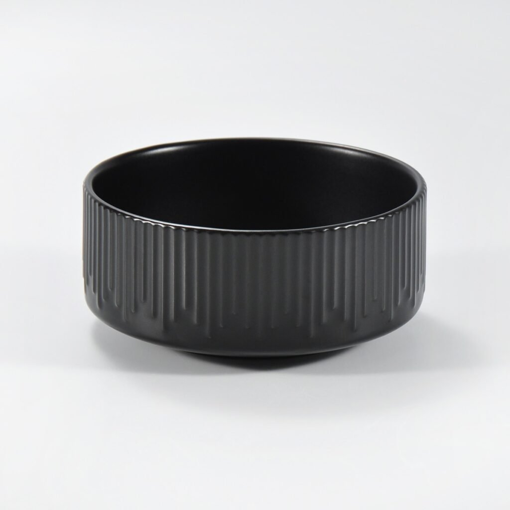 12-piece matte black embossed stoneware dinner set by Xuye Ceramics