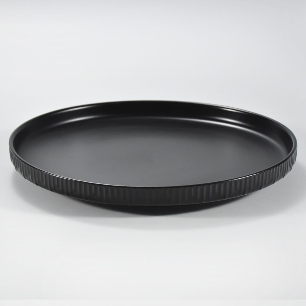 12-piece matte black embossed stoneware dinner set by Xuye Ceramics