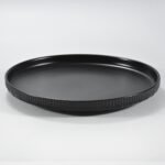12-piece matte black embossed stoneware dinner set by Xuye Ceramics