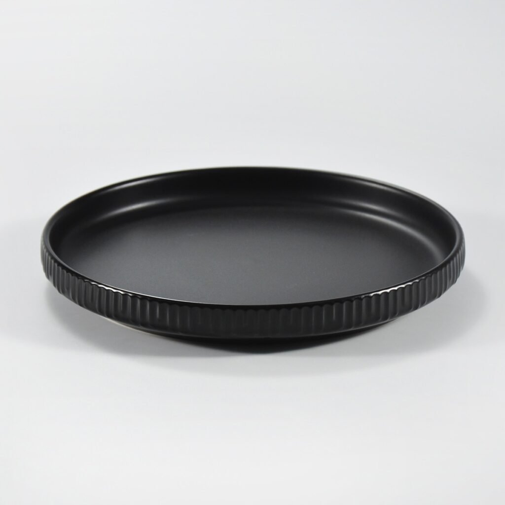 12-piece matte black embossed stoneware dinner set by Xuye Ceramics