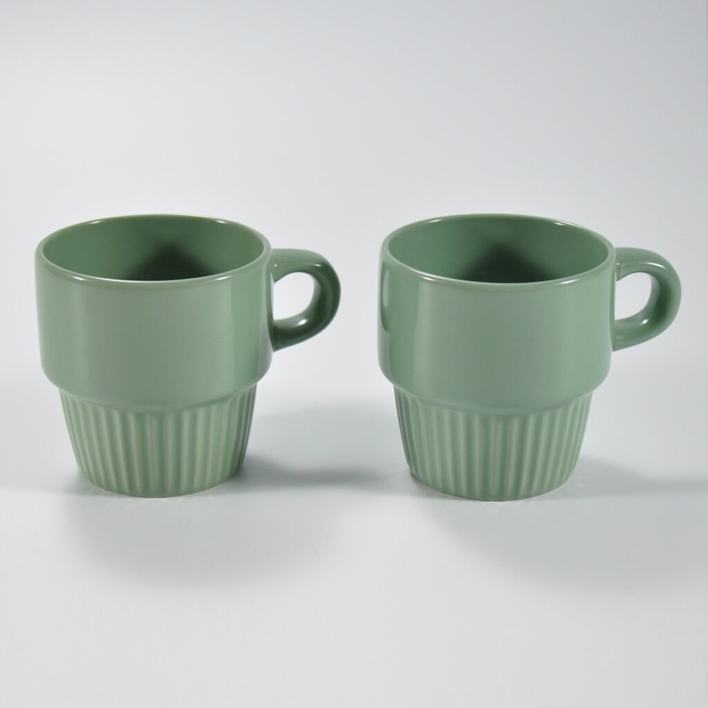 glossy multicolor stackable embossed ceramic mug by Xuye Ceramics