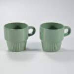 glossy multicolor stackable embossed ceramic mug by Xuye Ceramics