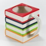 hand-painted multicolor book-shaped ceramic mug by Xuye Ceramics