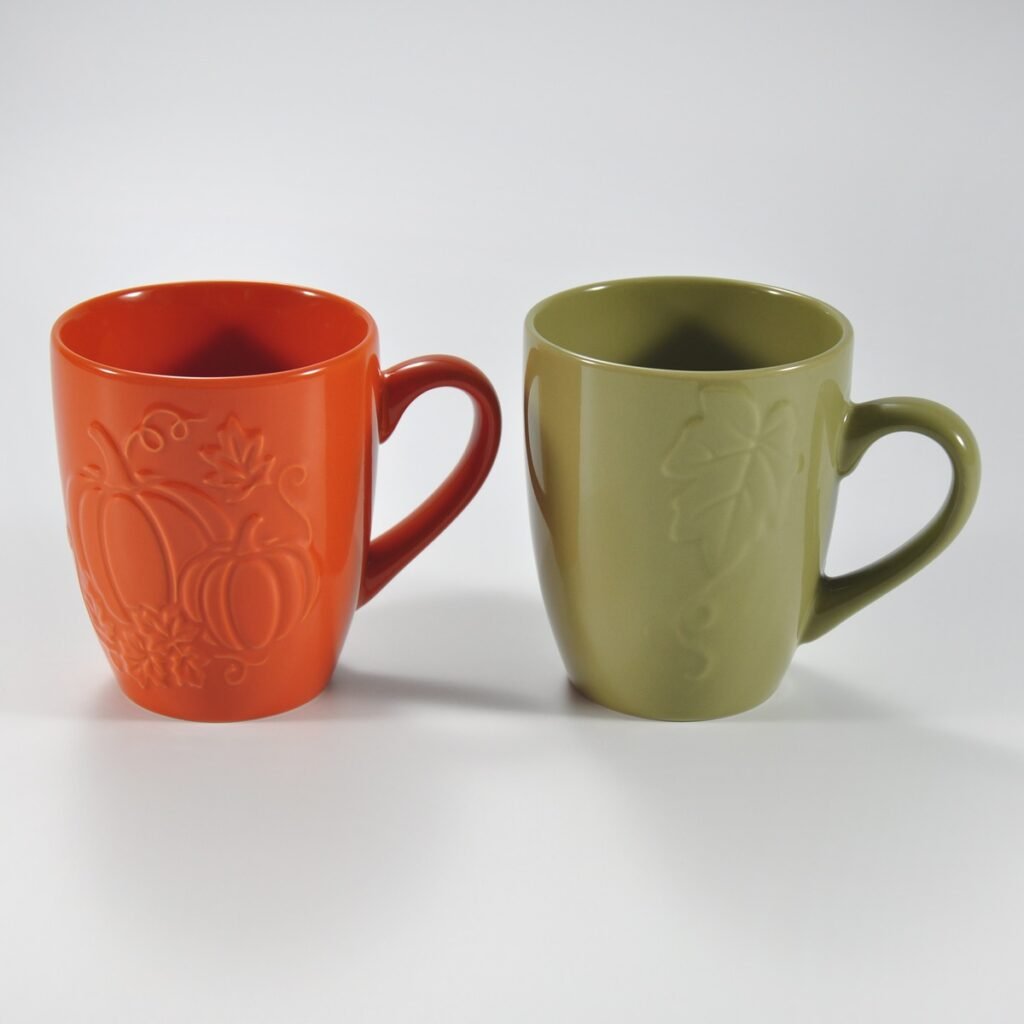 14 oz multicolor pumpkin-embossed ceramic mug by Xuye Ceramics