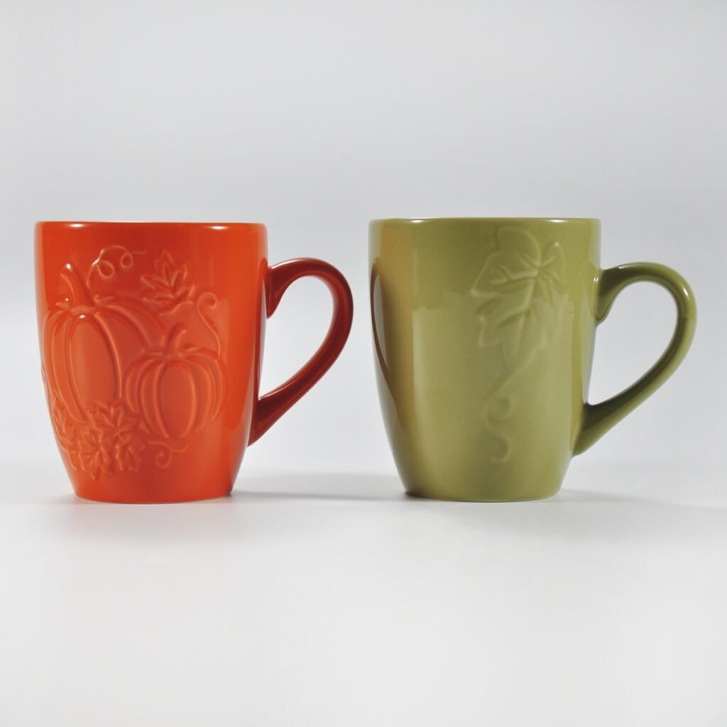 14 oz multicolor pumpkin-embossed ceramic mug by Xuye Ceramics