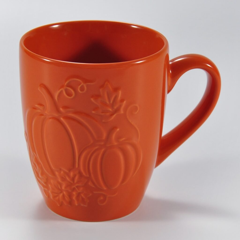 14 oz multicolor pumpkin-embossed ceramic mug by Xuye Ceramics