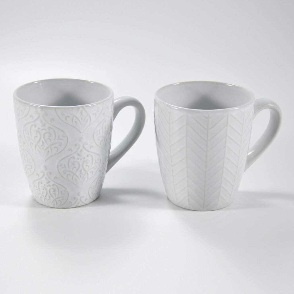 14 oz white textured embossed ceramic mug by Xuye Ceramics