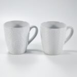 14 oz white textured embossed ceramic mug by Xuye Ceramics