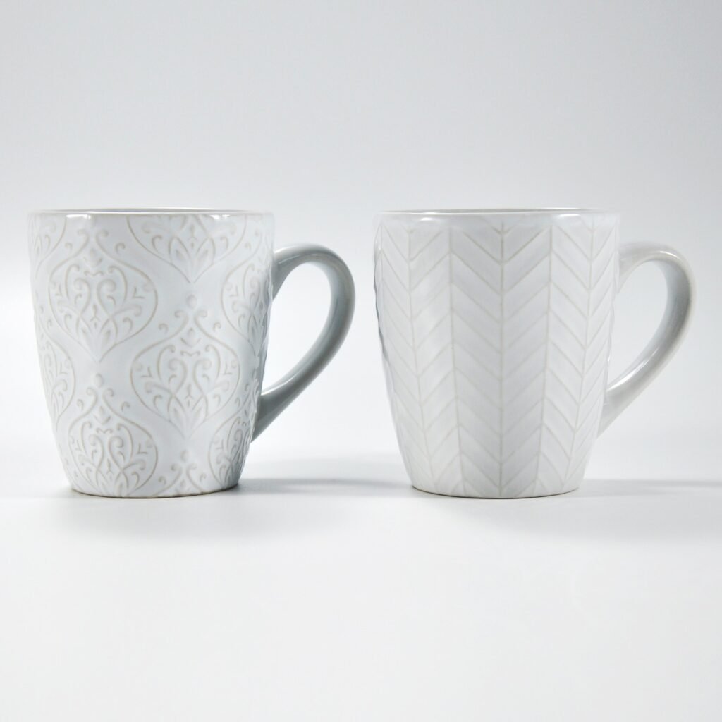 14 oz white textured embossed ceramic mug by Xuye Ceramics
