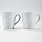 14 oz white textured embossed ceramic mug by Xuye Ceramics
