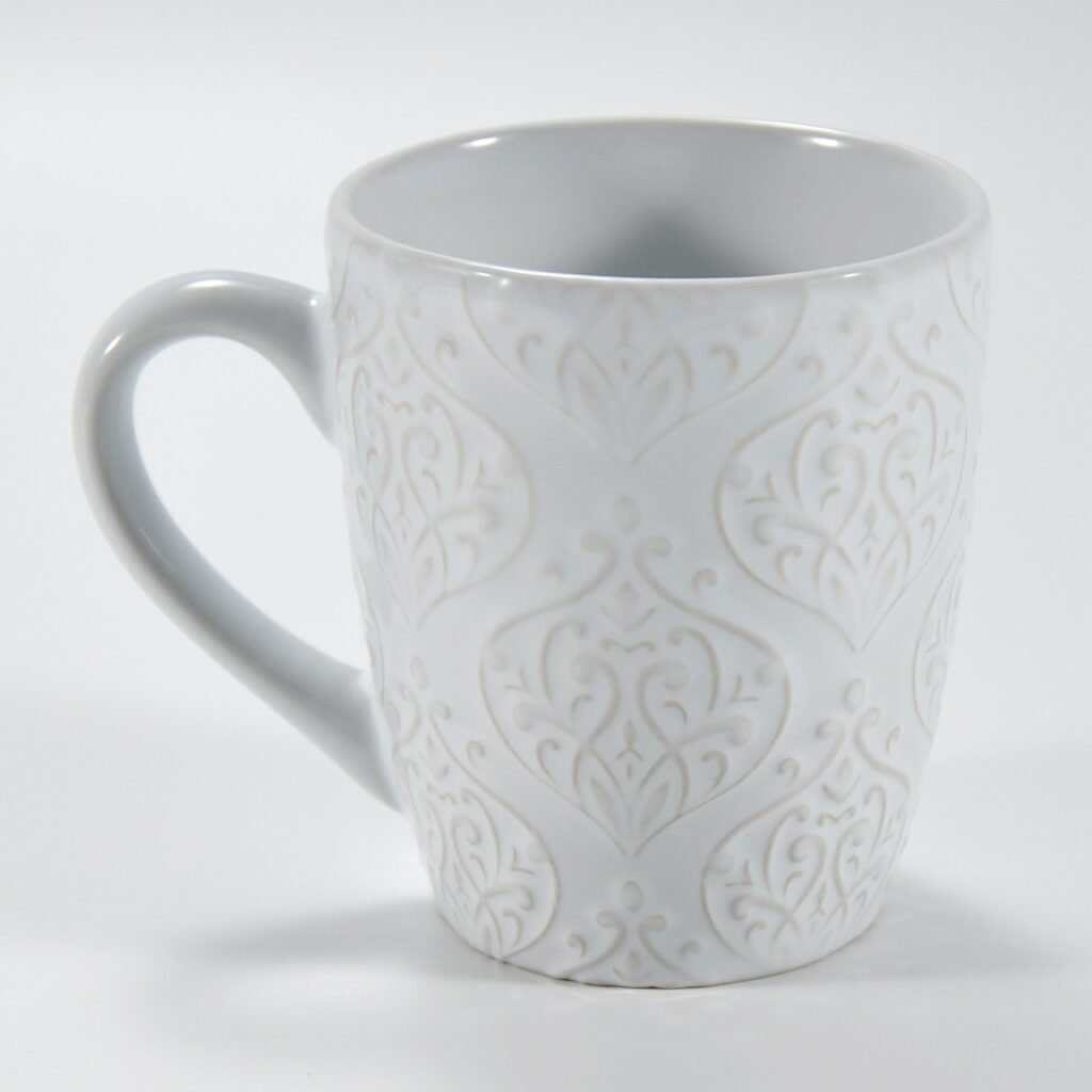 14 oz white textured embossed ceramic mug by Xuye Ceramics