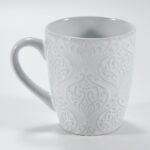 14 oz white textured embossed ceramic mug by Xuye Ceramics