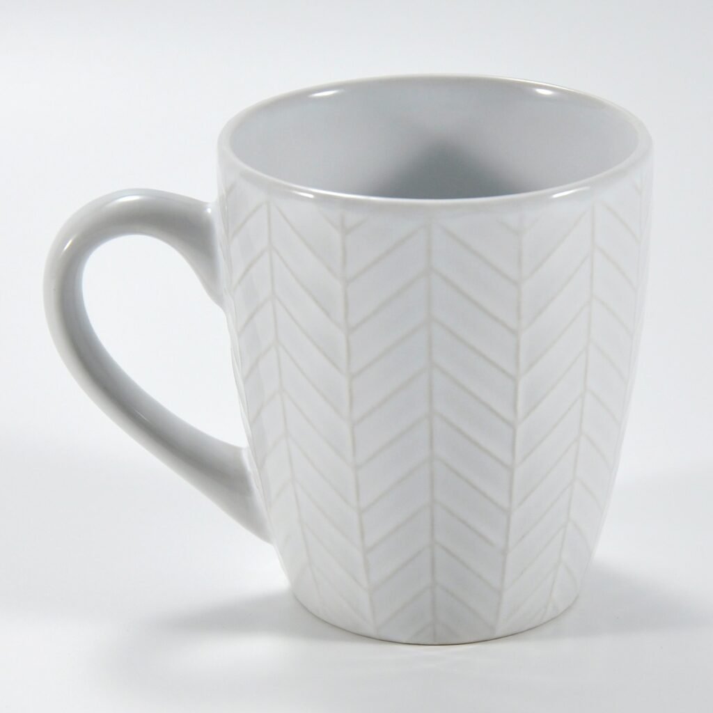 14 oz white textured embossed ceramic mug by Xuye Ceramics