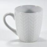 14 oz white textured embossed ceramic mug by Xuye Ceramics